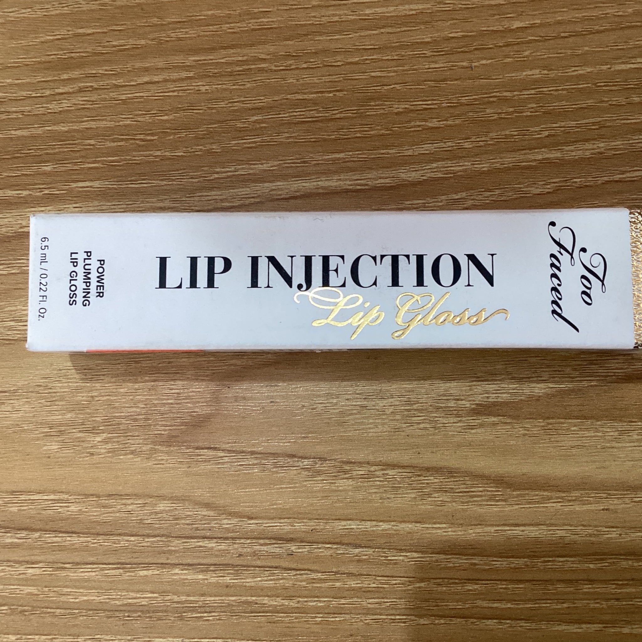 Brillo para labios con efecto luminoso Too Faced