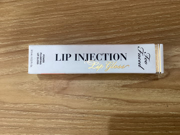 Brillo para labios con efecto luminoso Too Faced