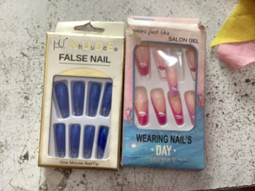 Uñas postisas***$