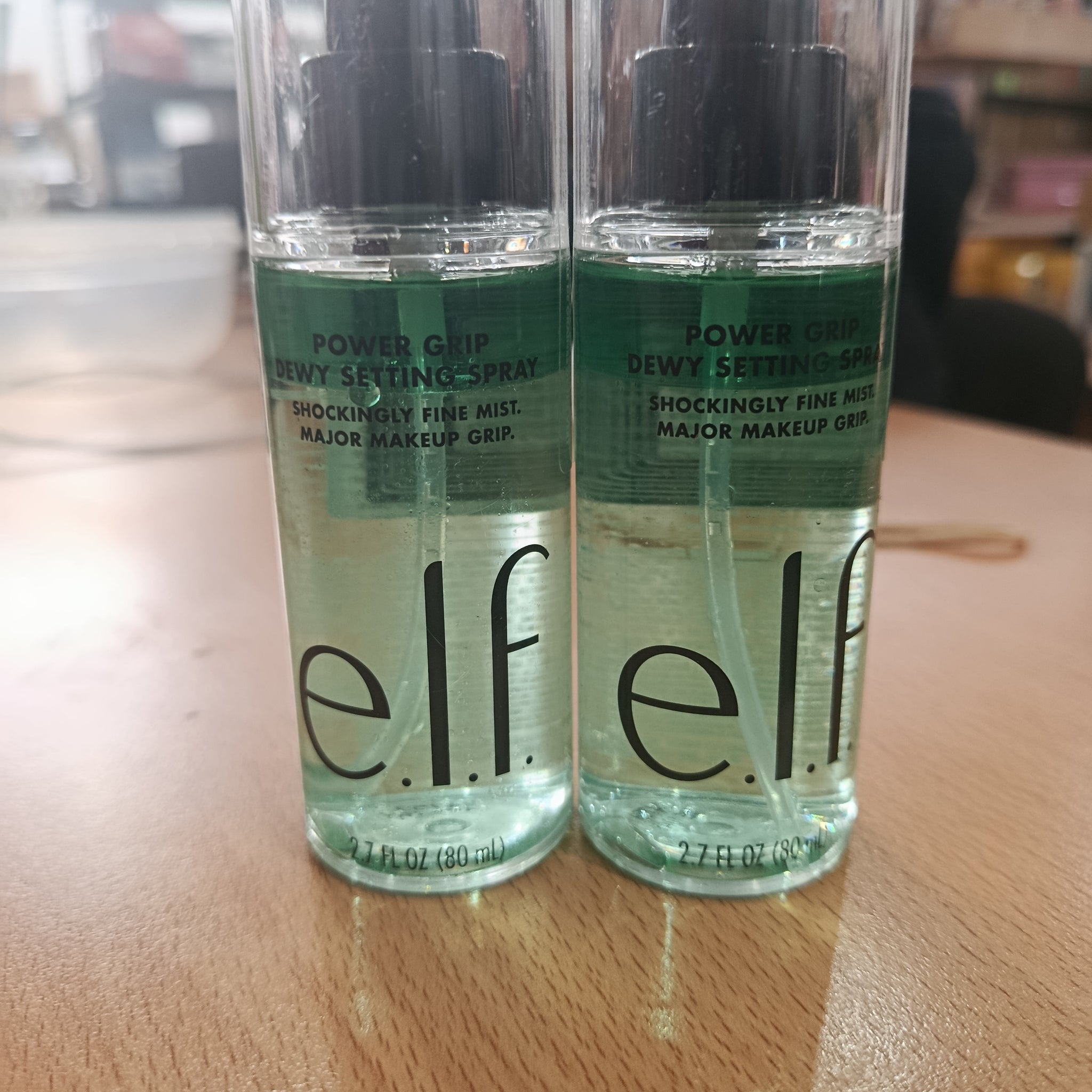 Power grip dewy setting spray ELF
